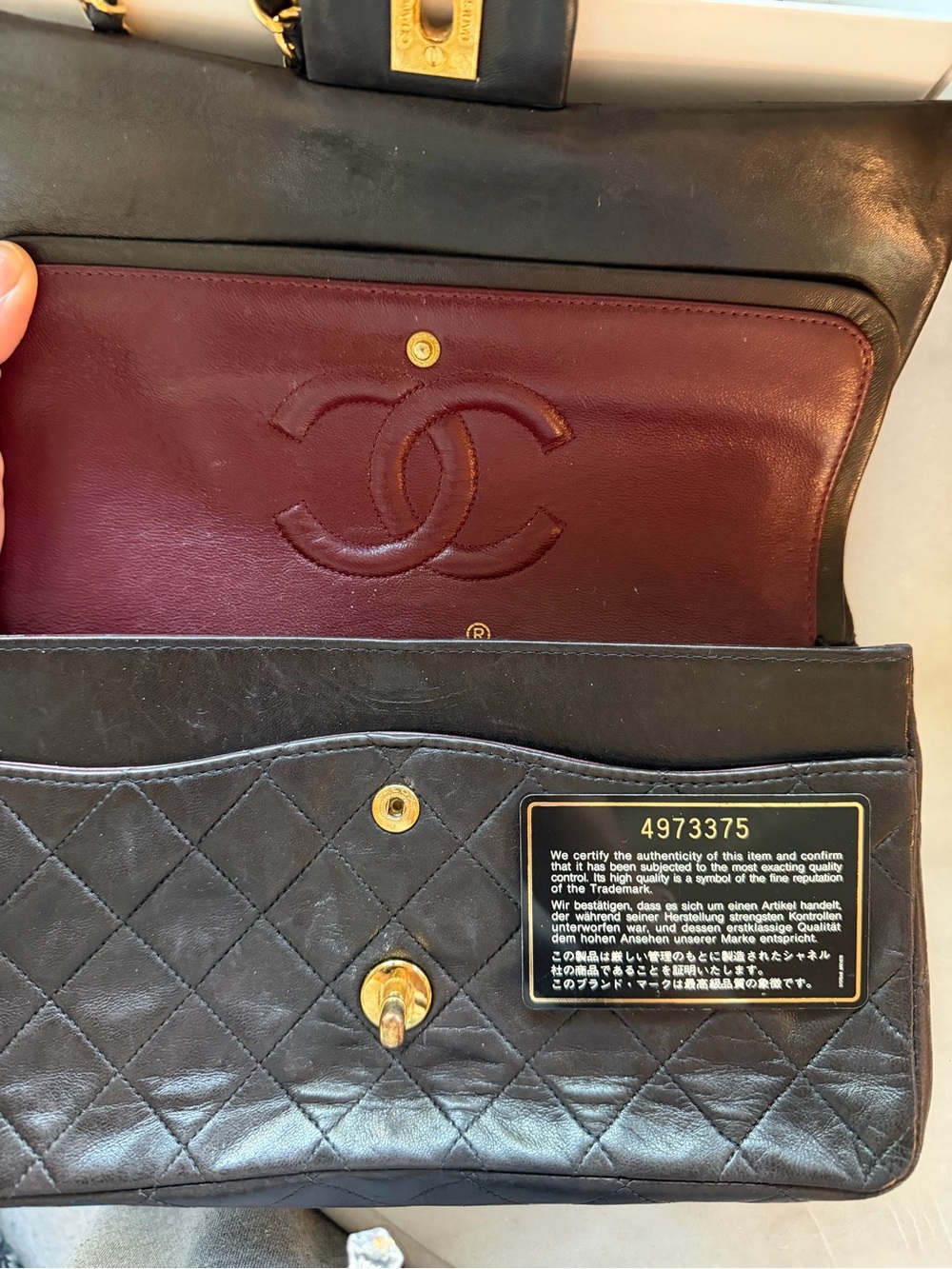 Authentic CHANEL Quilted Lambskin Shoulder Bag in Black with Gold Hardware - Picture 2 of 7